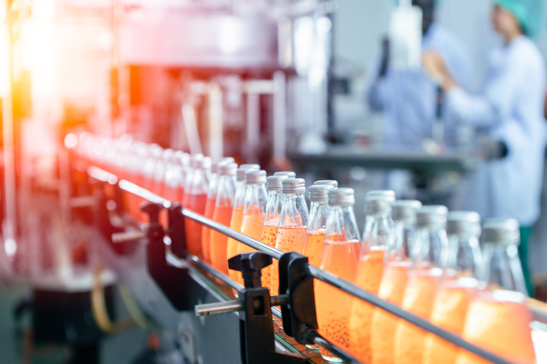 Line of beverages during manufacturing.