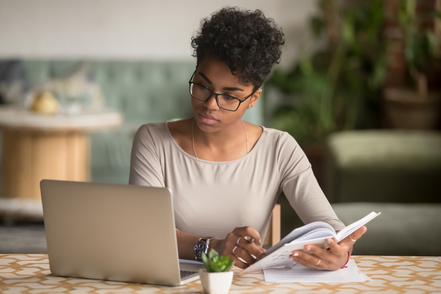 Woman doing research on a laptop.