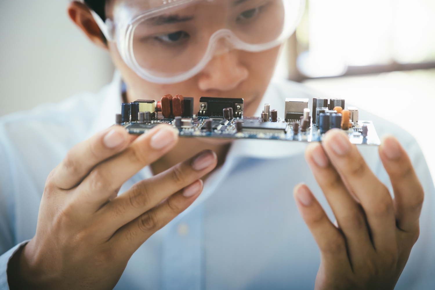 A lab technician performing product safety testing.