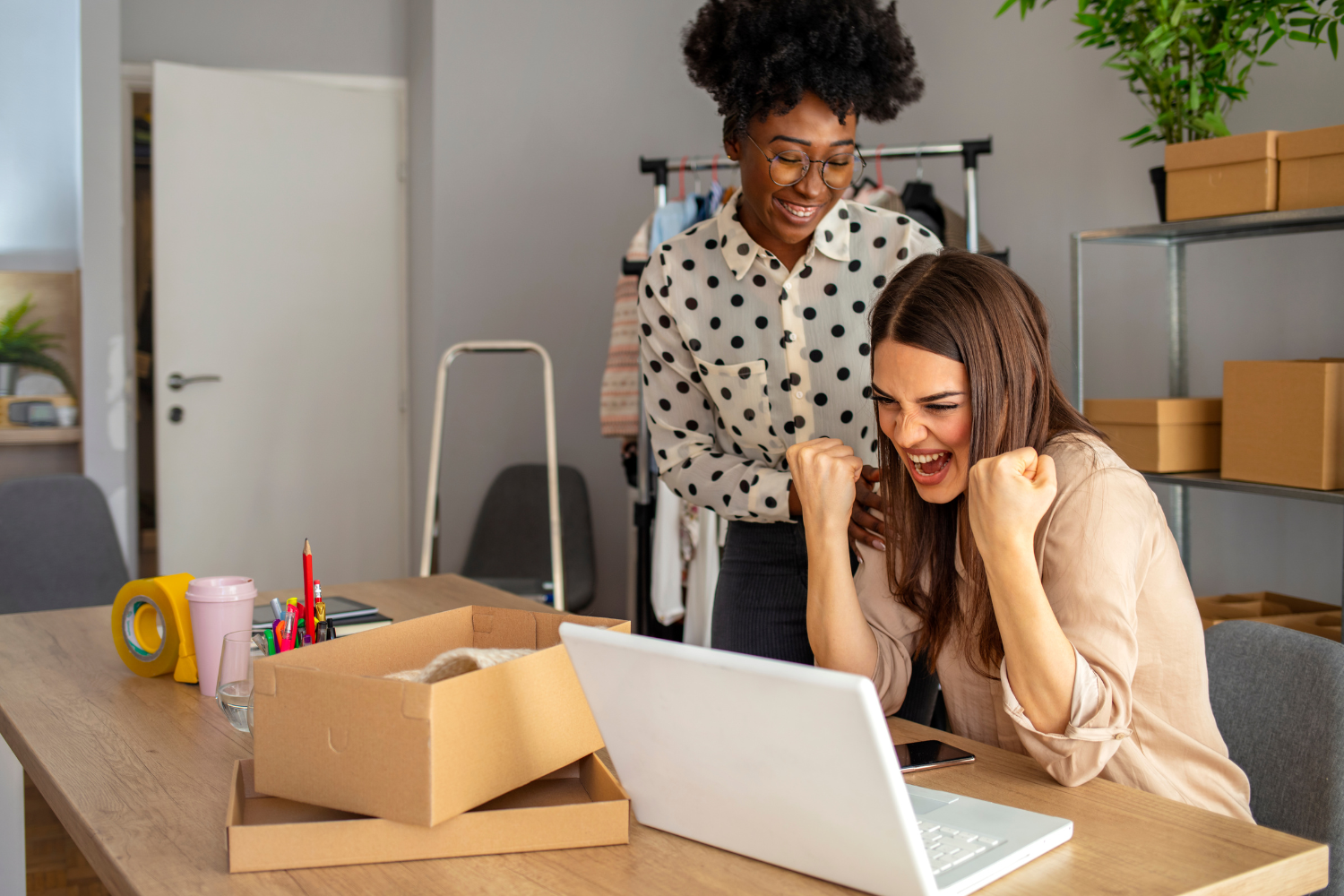 Two small business owners collaborating.