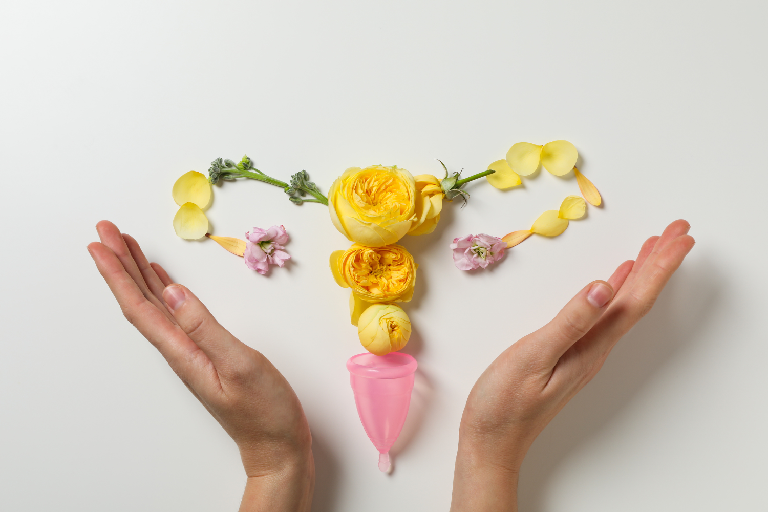 Image depicting a woman's reproductive organ made of flowers.