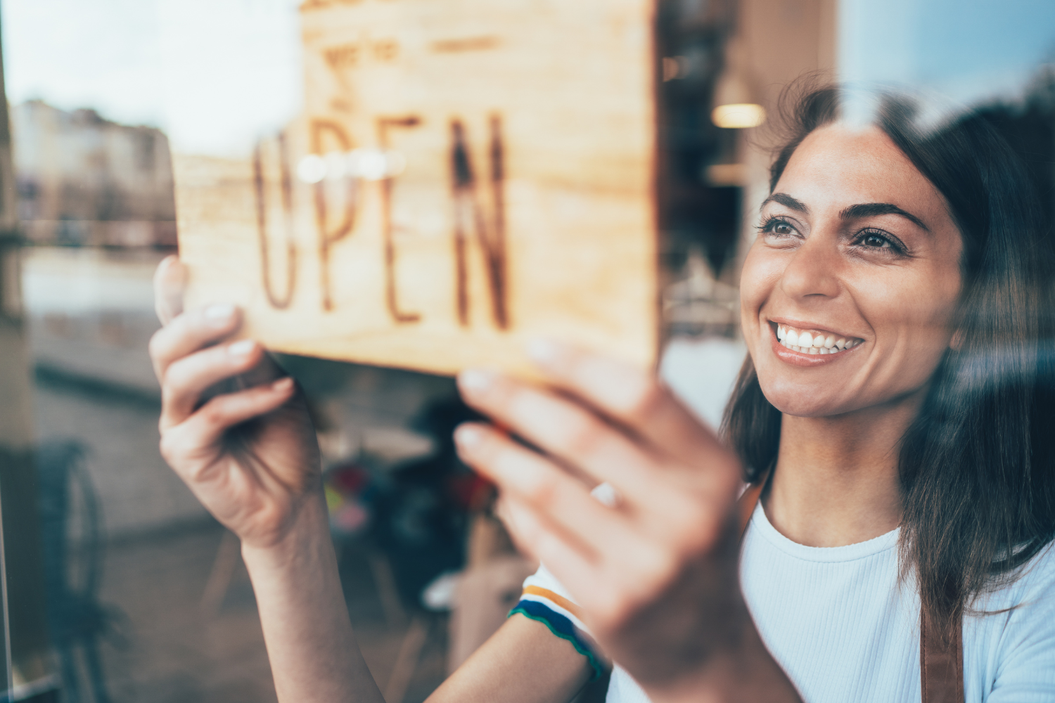 Business owner opening shop.