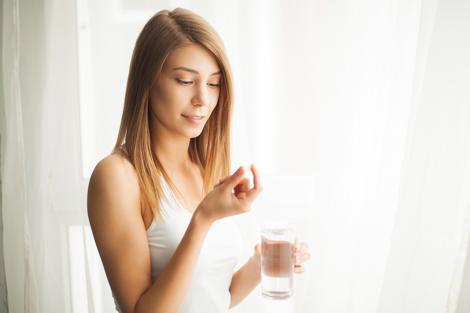 A professional taking a nootropic supplement.