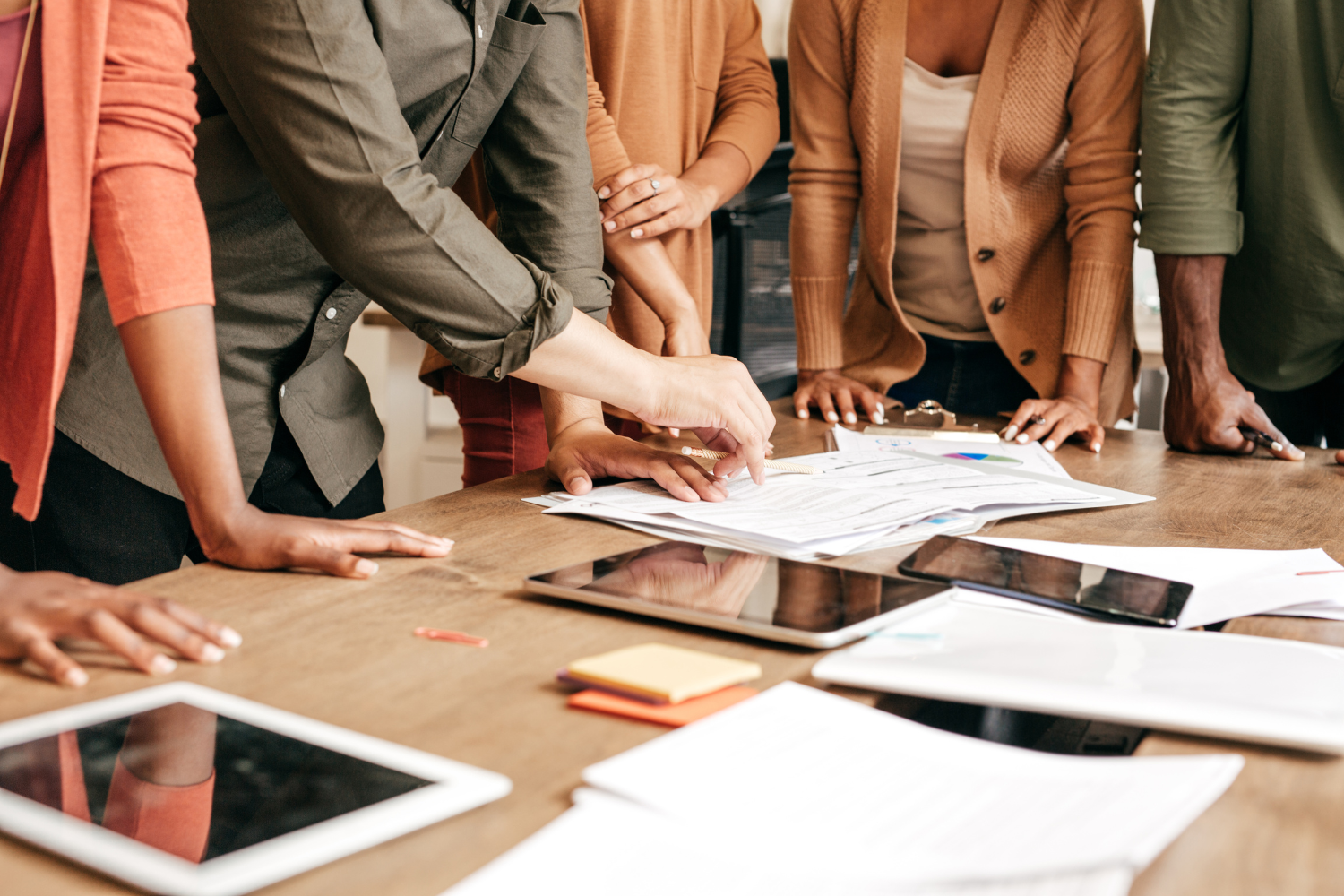 A team of marketers discussing marketing ads.