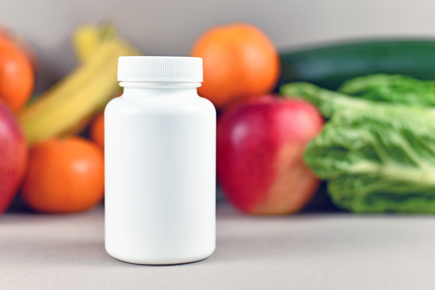 A blank supplement bottle.
