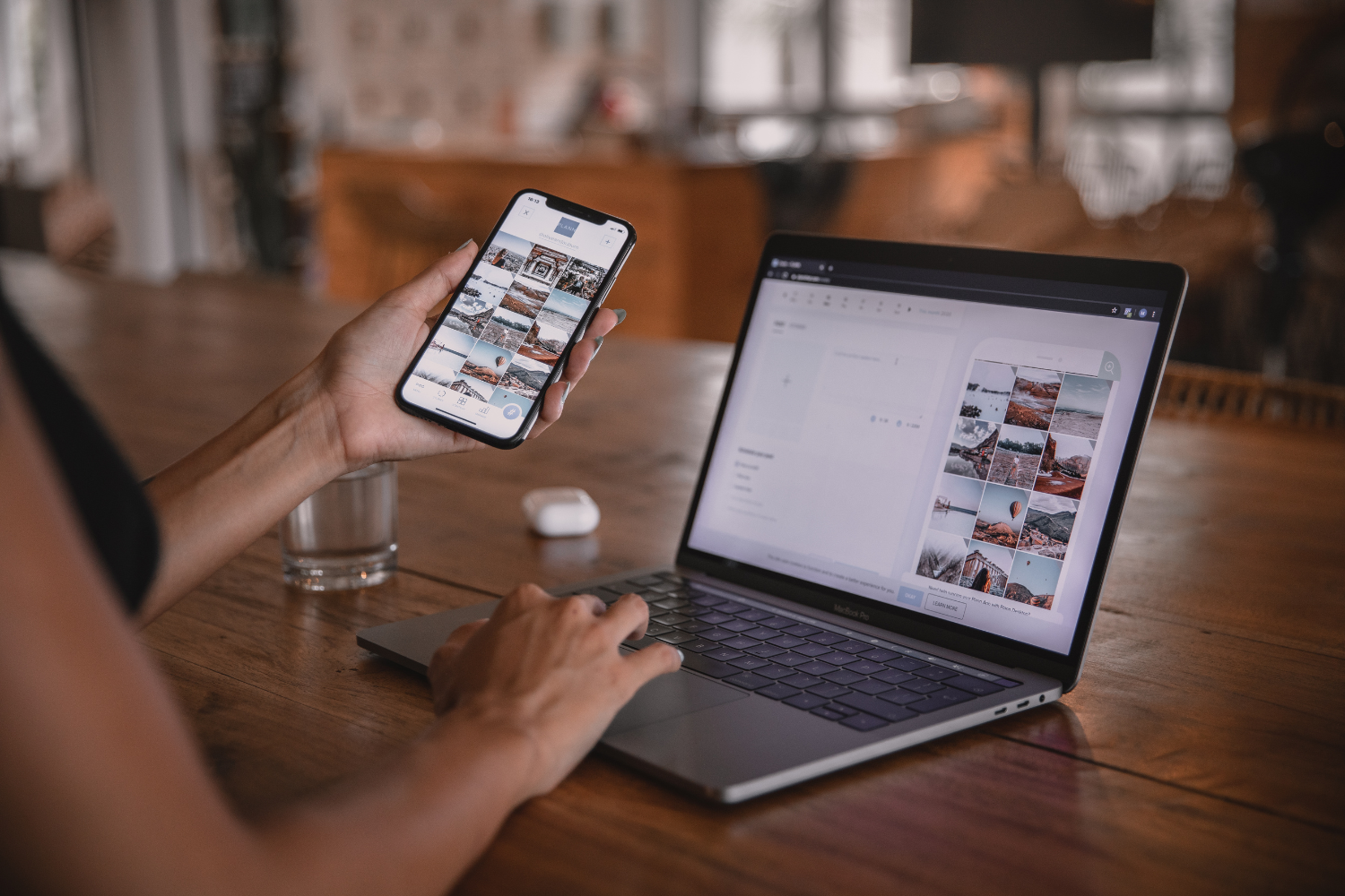 Smartphone and laptop with social media posts.
