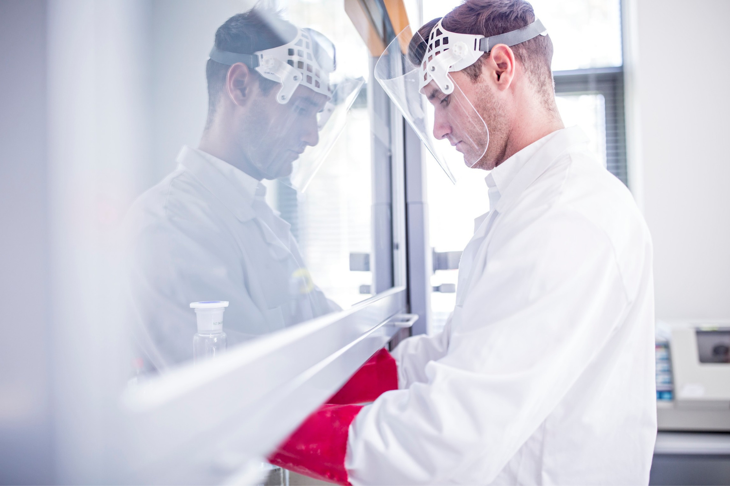 Lab worker in a protective gear.
