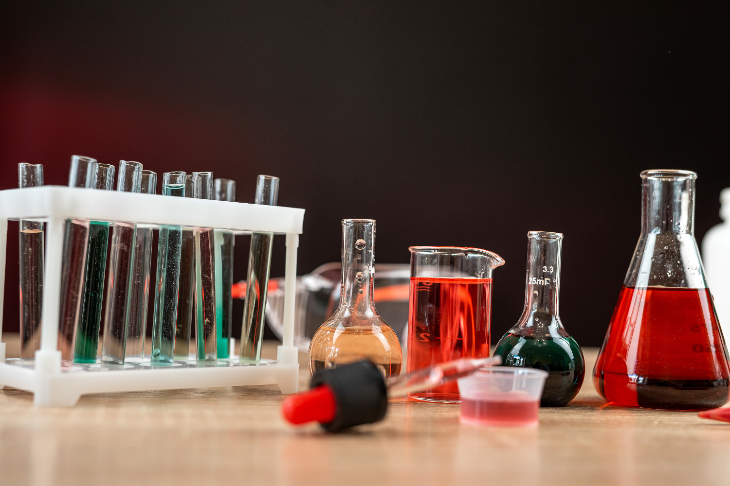 Test tubes and flasks with liquids in different colors.