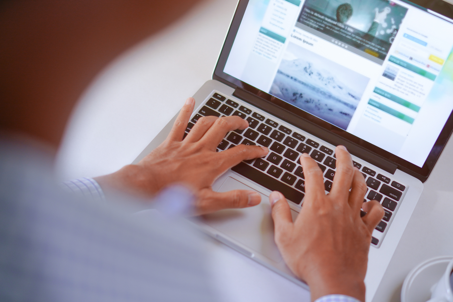 A person working on a content plan with a laptop.