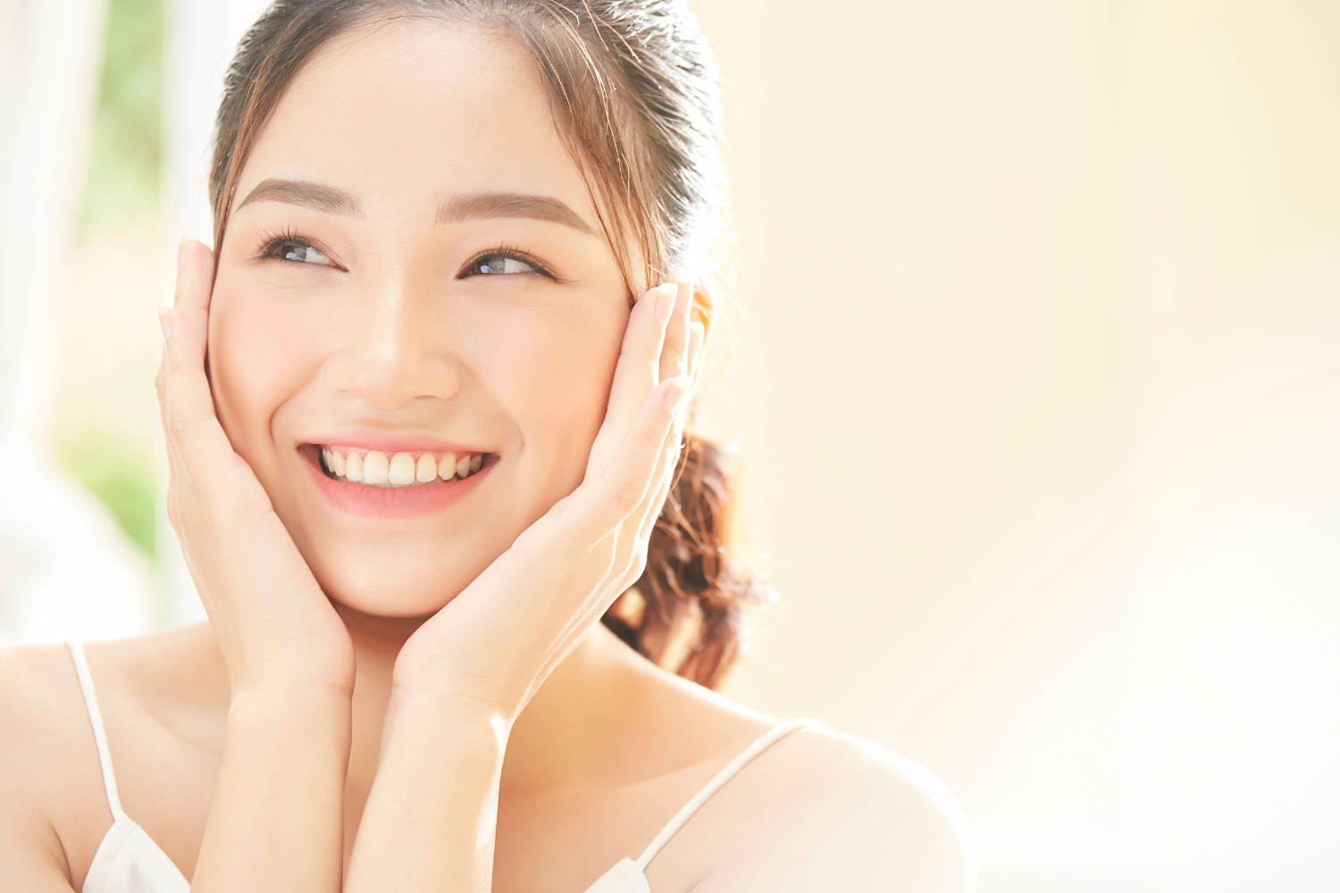 Woman with glowing skin.