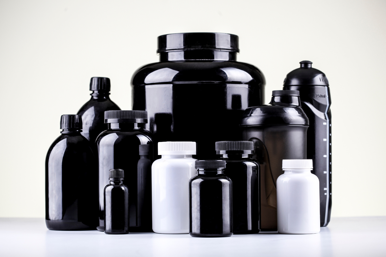 Glass and plastic supplement bottles.