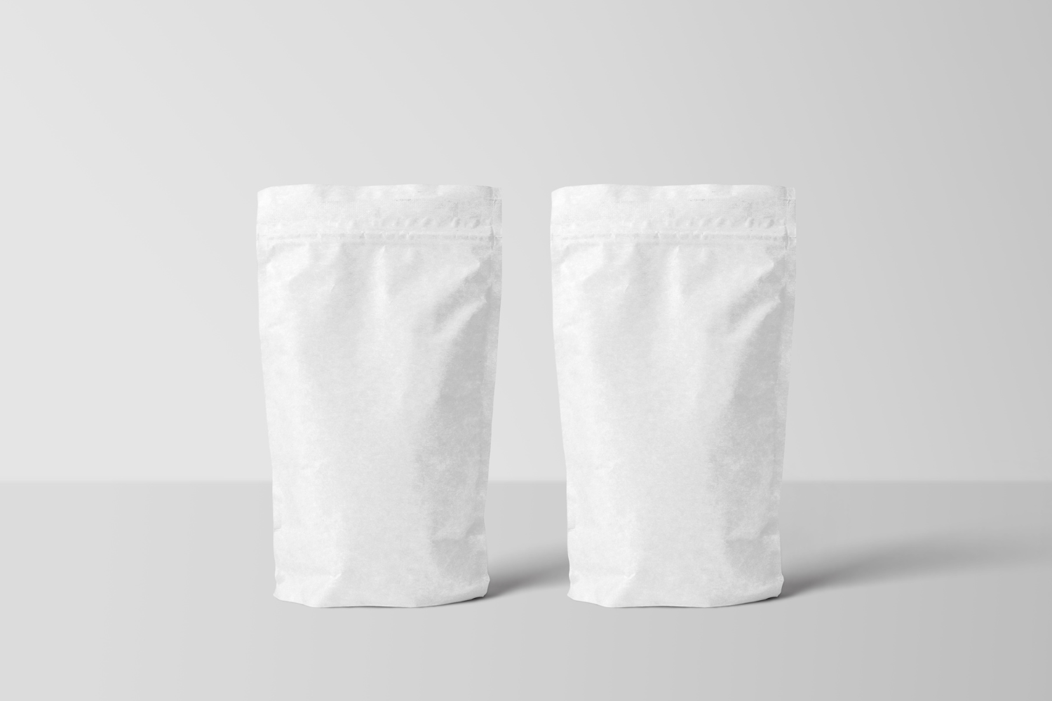Two white biodegradable pouches.