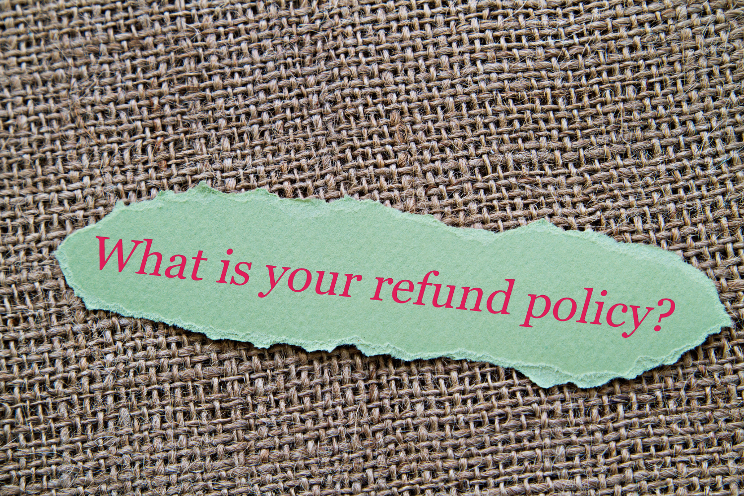 A paper  with a question "What is your refund policy?"