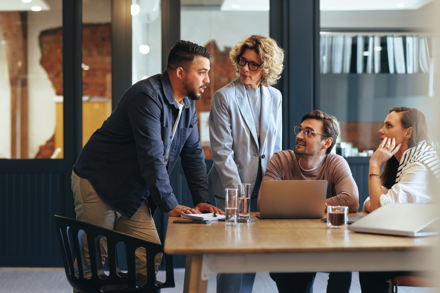 A digital marketing professional working on a laptop.