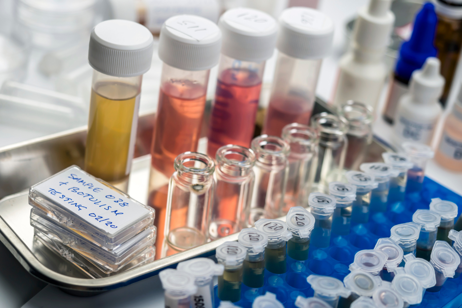 Contaminant testing with test tubes and contaminants in small vials.