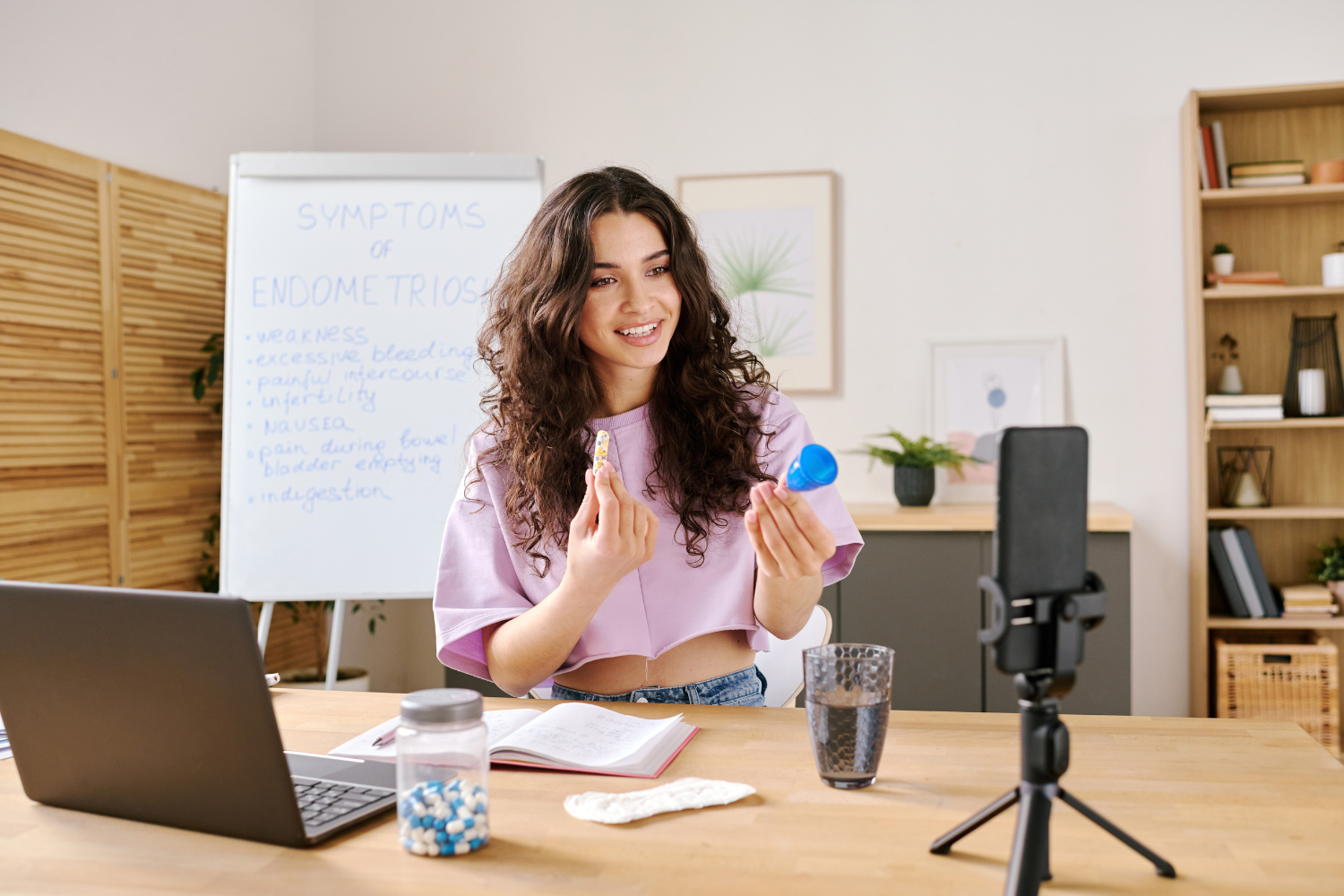 An influencer holding a nutrition product in a live stream.