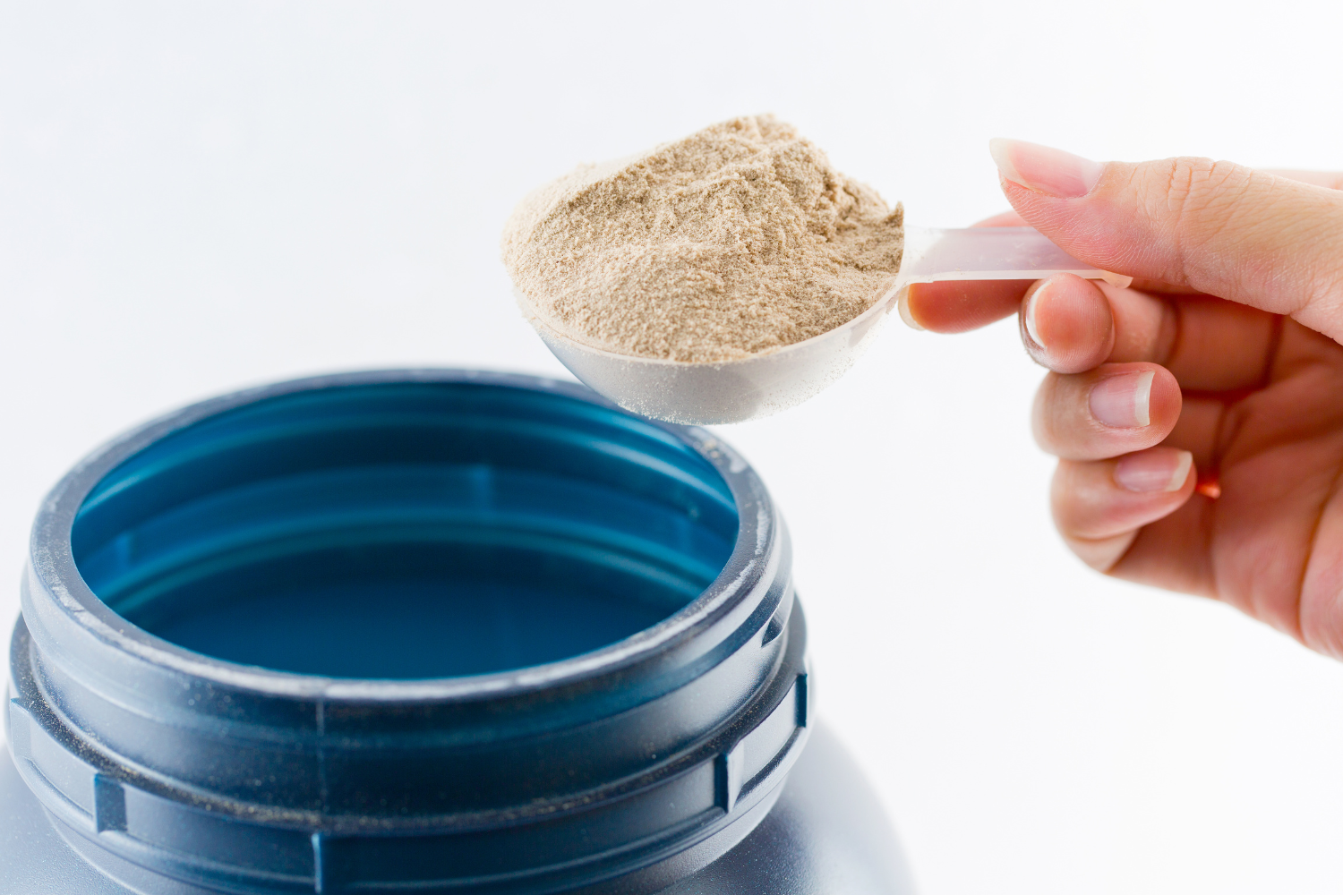 A scoop of powder supplements.