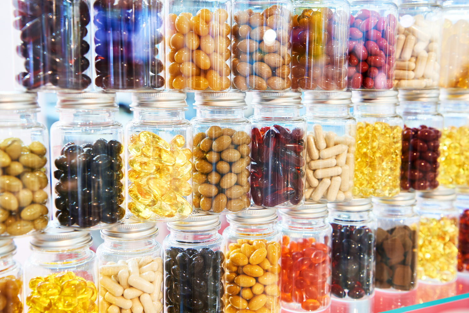 Various types of supplements in clear containers.