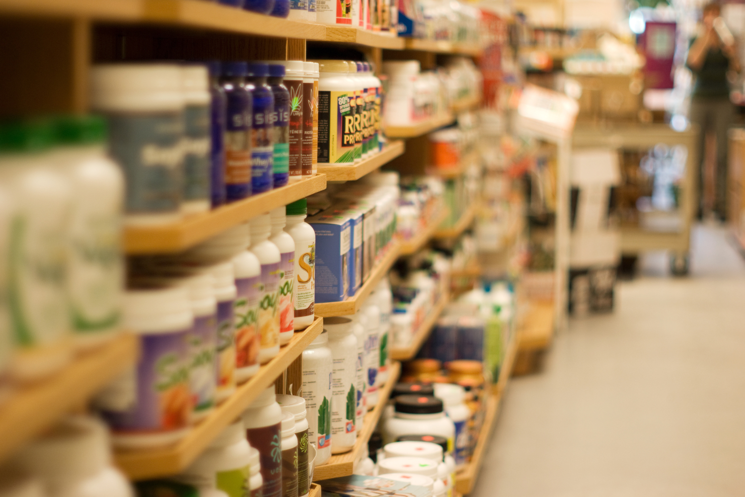 Rows of supplements in a grocery store.