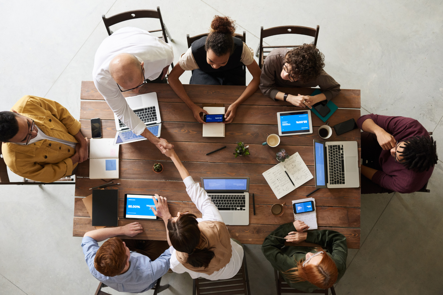 A team of supplement business professionals in a meeting.