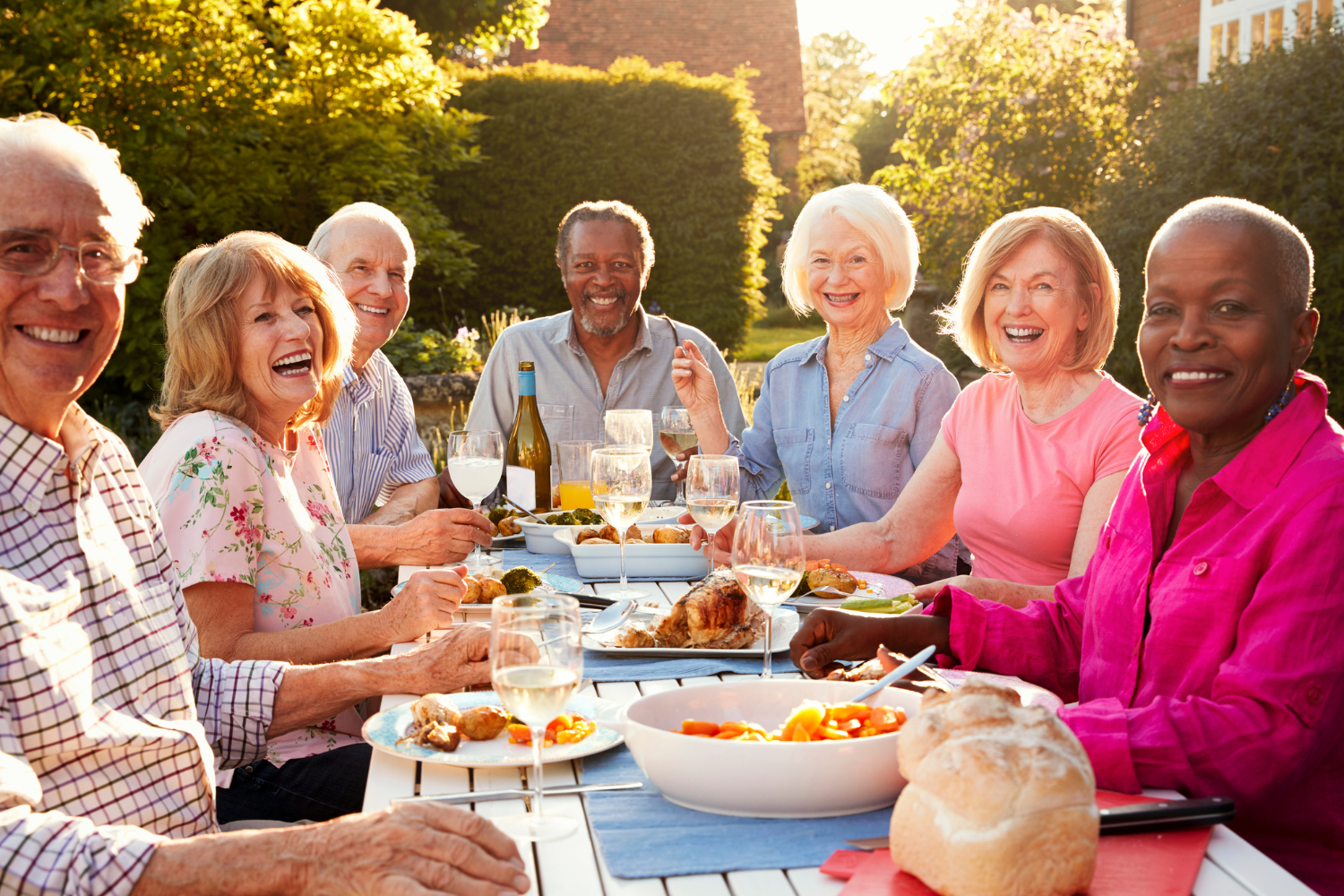 A group of seniors sitting around a table.