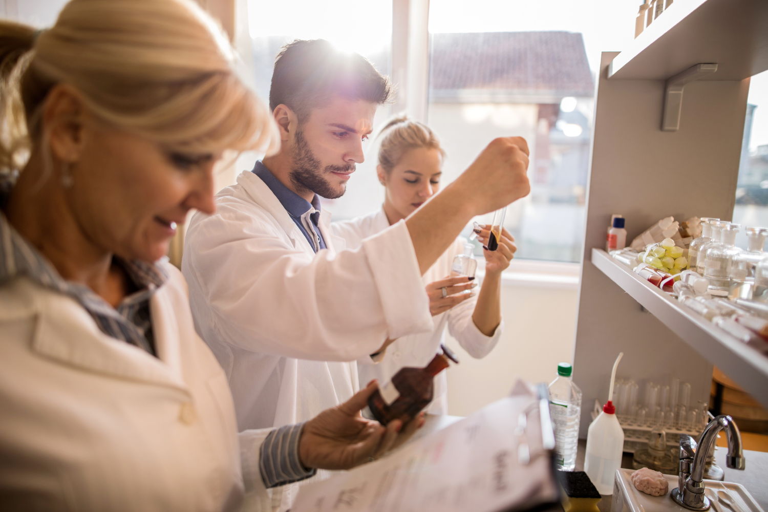 Lab technicians examining ingredients.