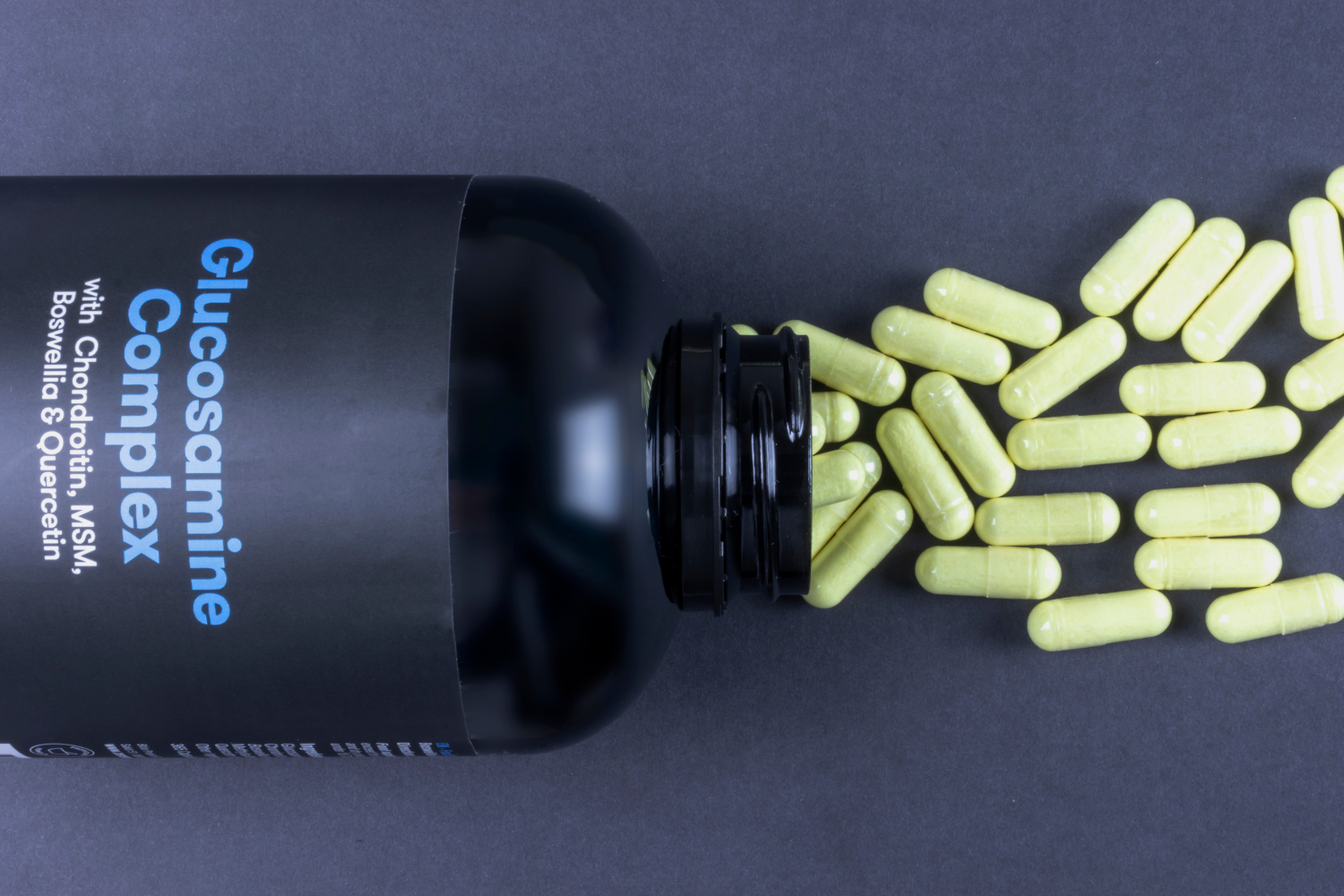 A close-up of a sports supplement bottle.
