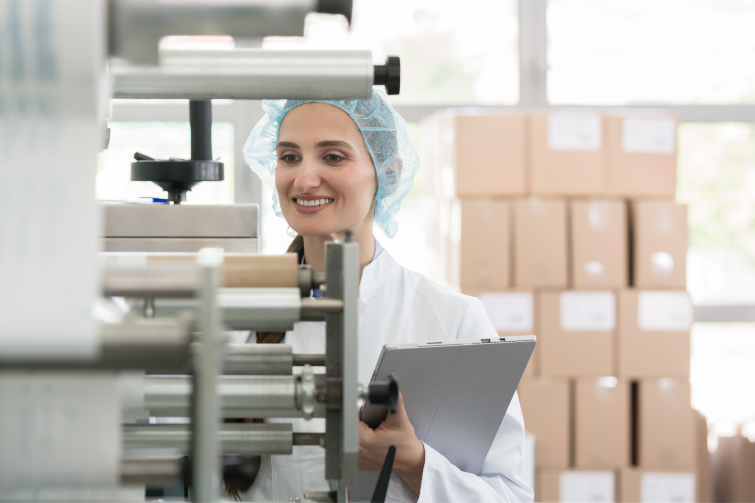 A manufacturing plant with a quality control specialist.
