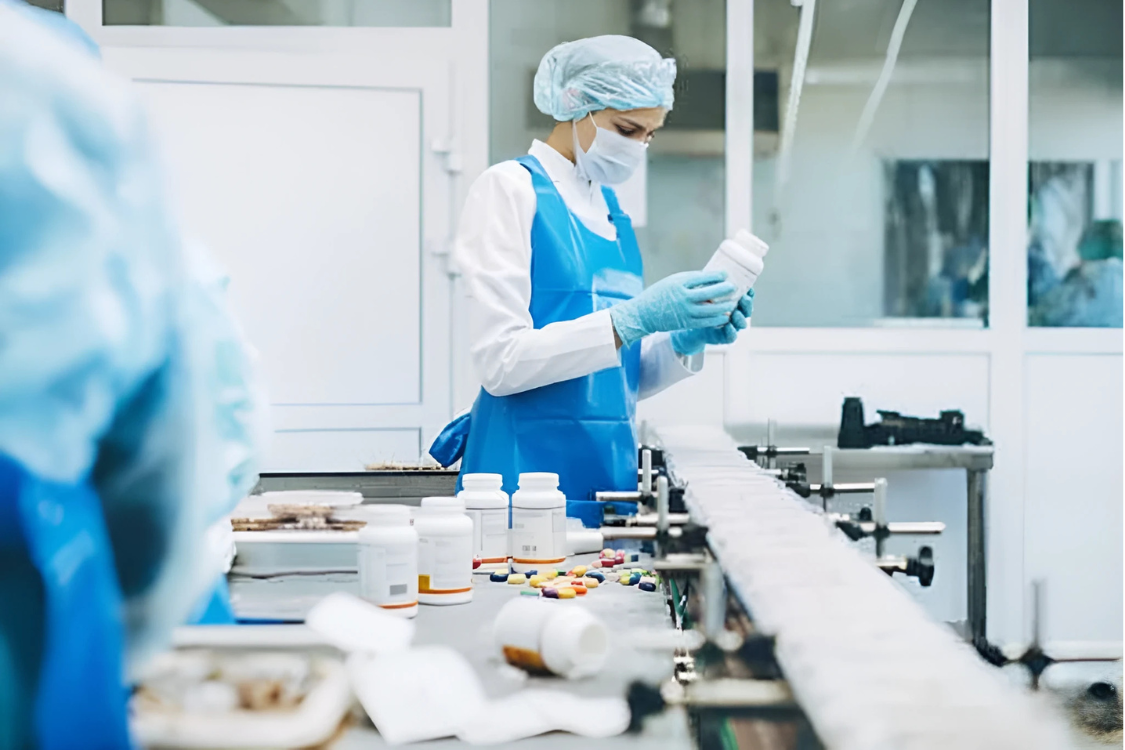 Supplement manufacturer worker checking product labels for compliance