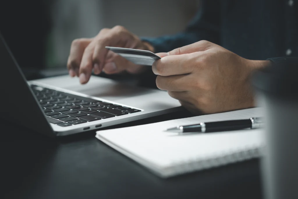 Person researching supplement manufacturer financial records online