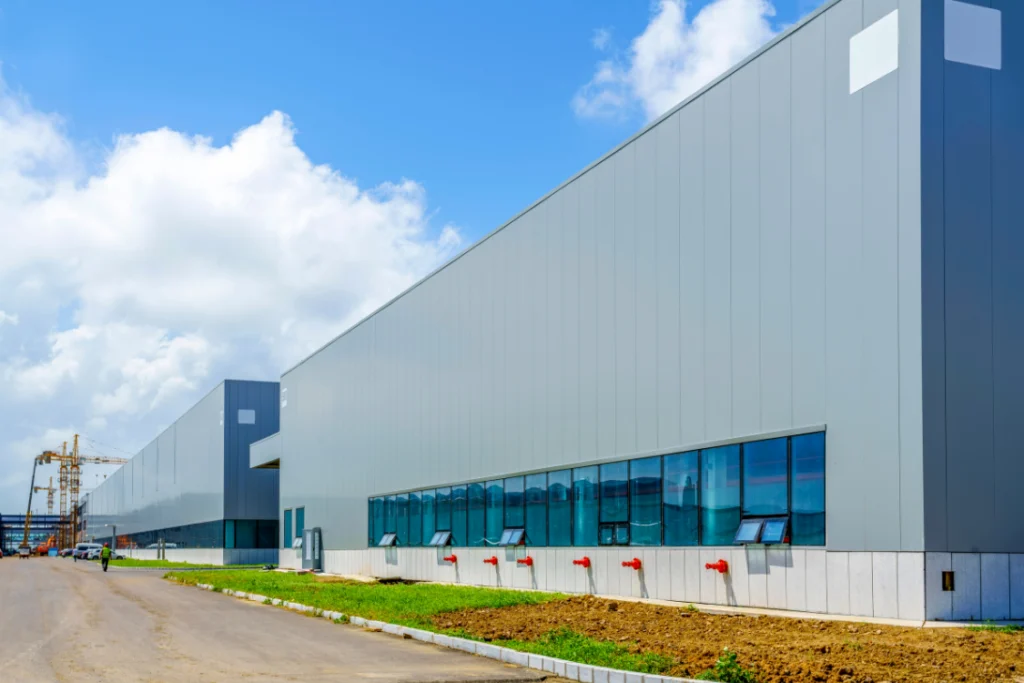 Modern supplement manufacturer facility exterior with large production space