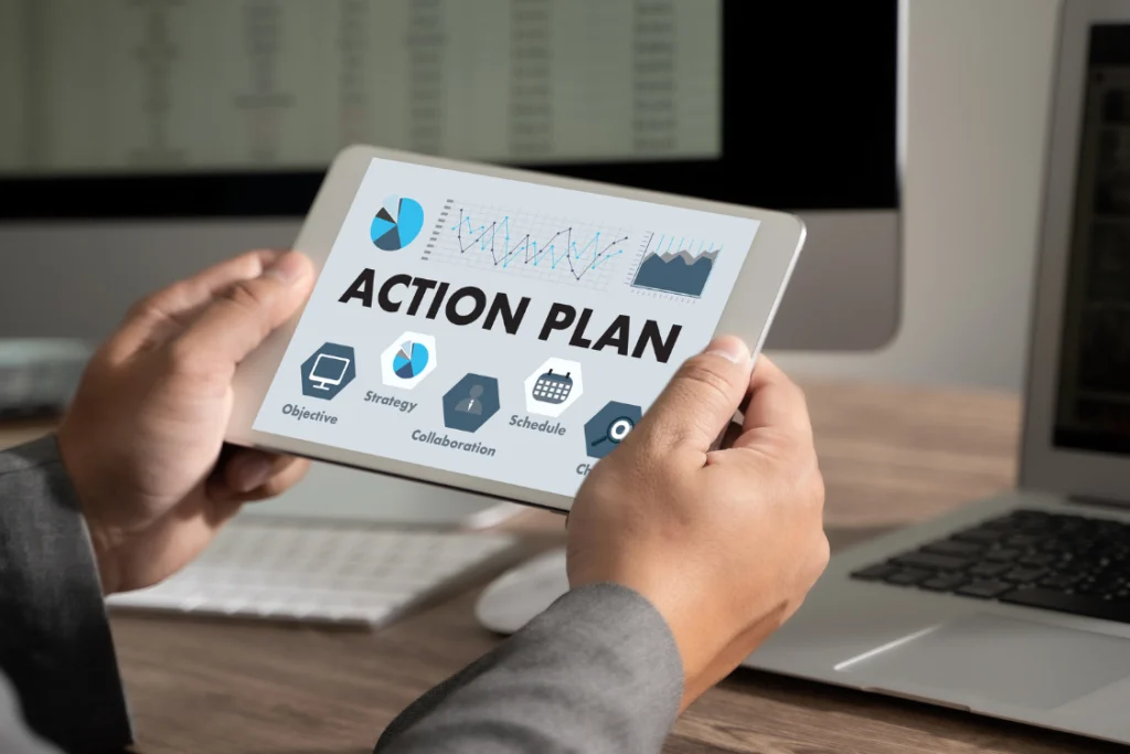Hands holding a tablet displaying an Action Plan with icons for Objective, Strategy, Schedule, and Collaboration, reflecting the planning with a low MOQ supplement manufacturer.